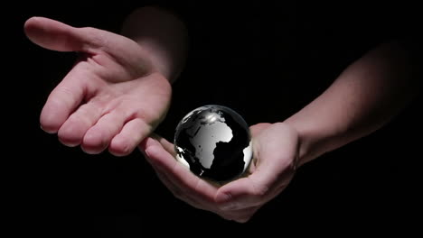 Animation-of-hands-revealing-globe-earth