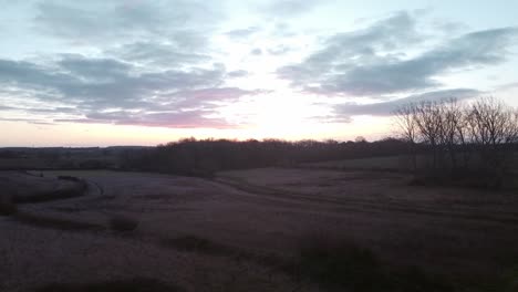 Sunrise-over-cabin-in-remote-English-countryside