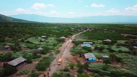 Motorcycle-Tours-Traveling-To-Lake-Magadi-In-Kenya---aerial-drone-shot