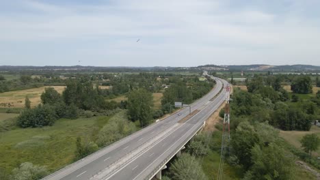 Aerial-view-of-the-A1-in-Coimbra-portugal,-this-is-the-most-important-highway-in-portugal-as-it-connects-Lisbon-to-Porto