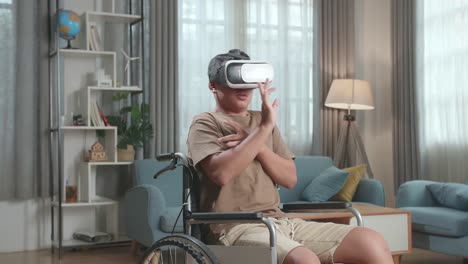 teenager in wheelchair using vr headset