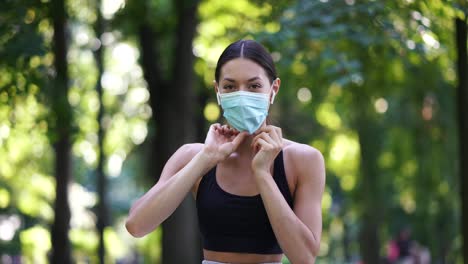 woman wearing a mask in a park