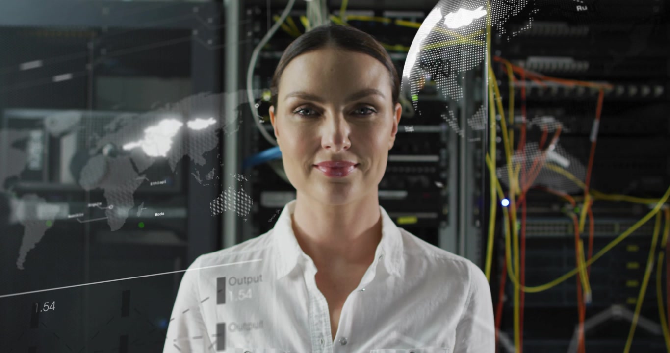 Female IT Professional Analyzing Digital Data in Server Room