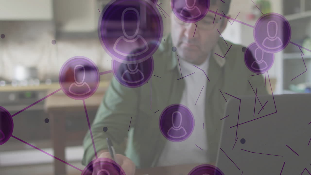 Man working at desk with network of connections animation overlay