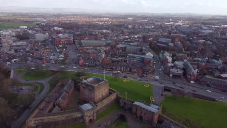 drone reveals carlisle castle with carlisle city in the background - cumbria, england