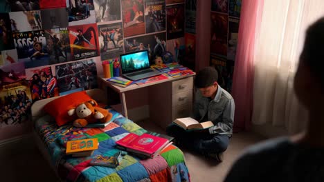 a boy reading in his colorful bedroom