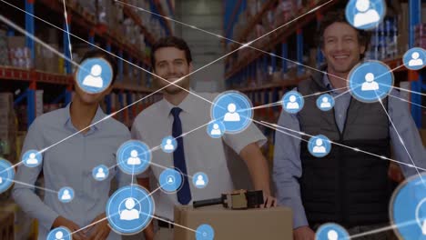 Animation-of-network-of-connections-with-icons-over-happy-diverse-warehouse-workers
