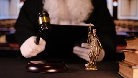 a detailed courtroom scene featuring a prominent gavel alongside lady justice, symbolizing law and order