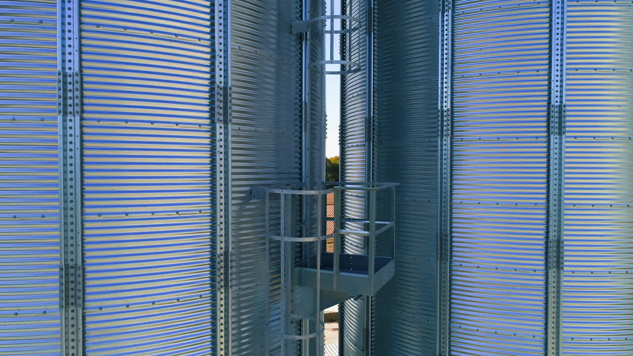 Metal elevator in agriculture zone. Grain Warehouse or depository.