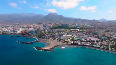 costa adeje and playa troya coastline in tenerife, sunny day, aerial view