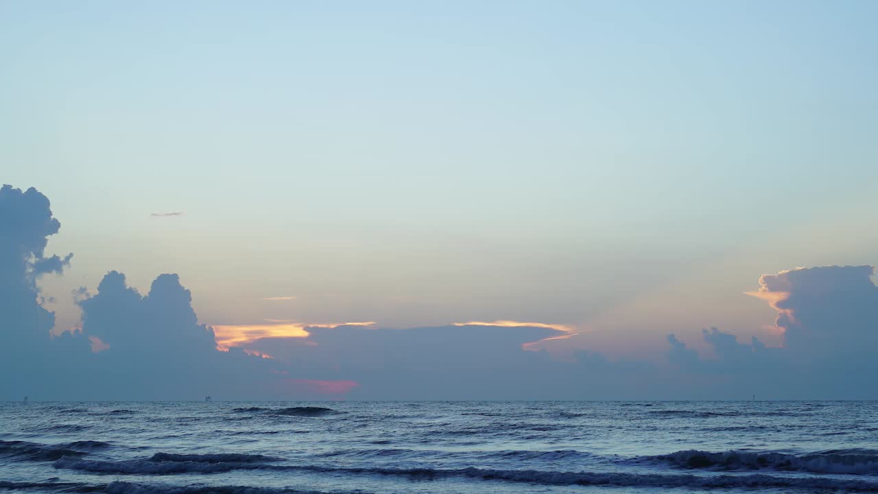 A time lapse of the sun rising over the ocean in Galveston Texas