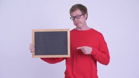 studio shot of young handsome man