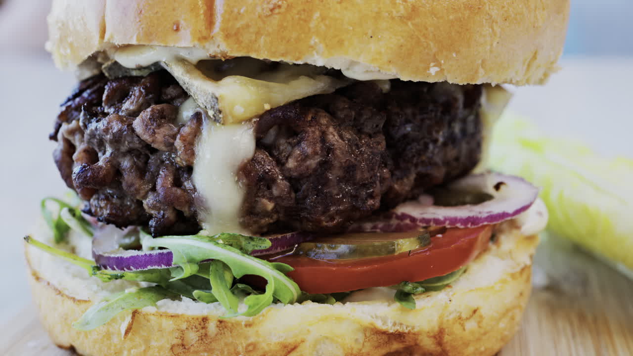 Close up of a hamburger on a plate at a restaurant