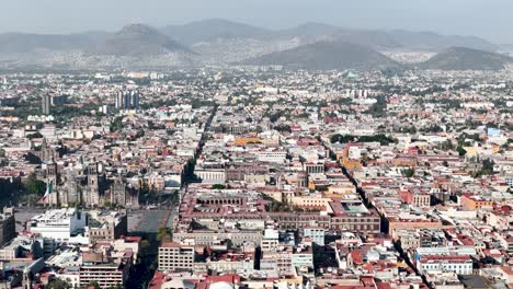 drone shot of downtown mexico city and national palace in december