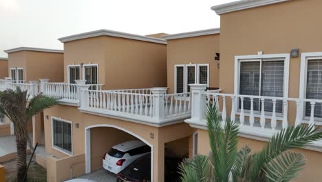 Rising-aerial-footage-of-identical-homes-with-solar-panels-on-roofs