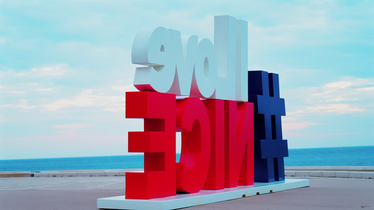 View of the I Love Nice sign on the promenade overlooking the sea in Nice, France
