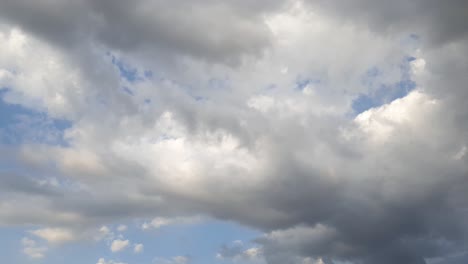 Mid-afternoon-thunderstorm-rain-clouds-forming-and-blending-across-the-african-horizon-time-lapse,-noise-free-4k-footage