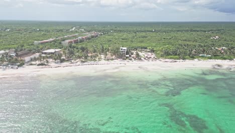 sunny xpu-ha beach, turquoise sea, lush forest, riviera maya mexico