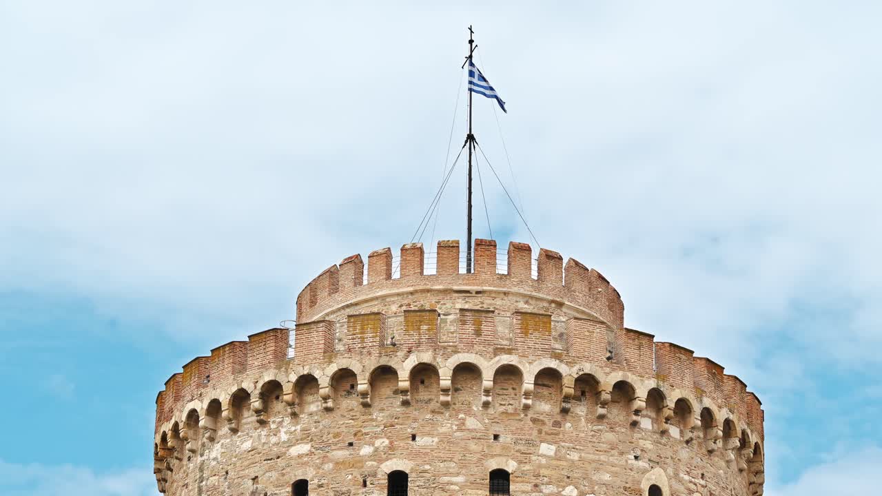 A White Tower view, a historically important building with a Greek flag on the top
