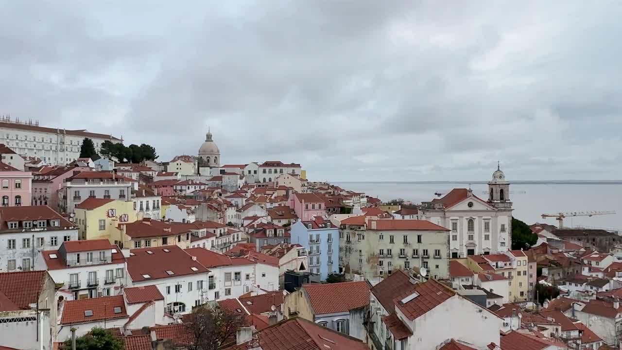Panoramic view of Lisbon from Miradouro das Portas do Sol with São Jorge Castle.
