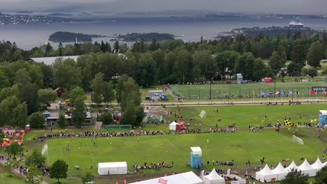 drone glides sideways along the soccer pitches at ekebergsletta during the norway cup 2023, just outside the center of oslo