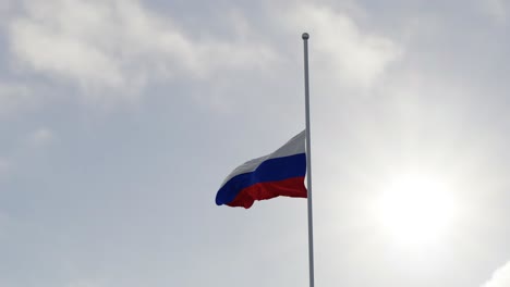 flag of russia half mast in the wind