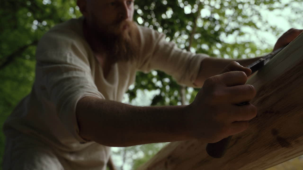Medieval Craftsman Working with Wood