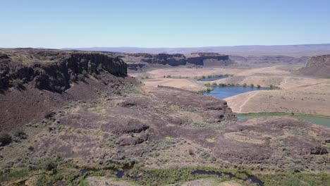 ancient lakes plunge pools below ancient dry waterfall, wa scablands