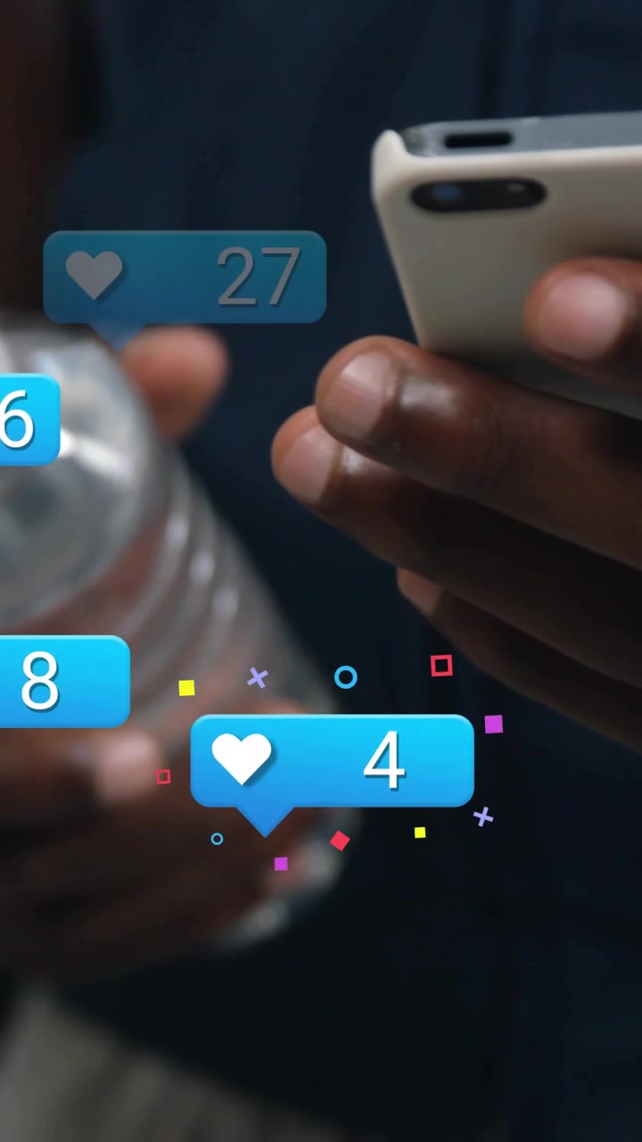 Vertical video: Man tapping phone holding bottle popping likes around hands counting up for social
