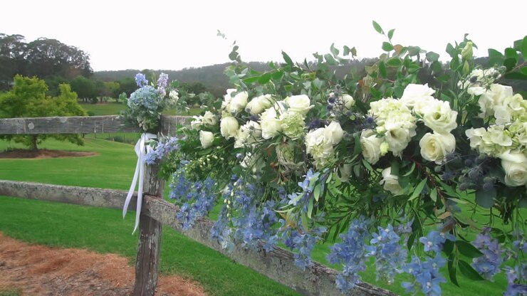 Beautiful White Roses Arrangement Ornate During Outdoor Nature Wedding
