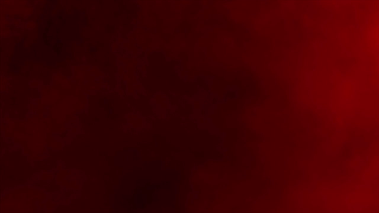 A subtle layer of red fog or mist drifts slowly across a dark screen. Atmospheric overlay for creating a moody, horror, or dramatic ambiance