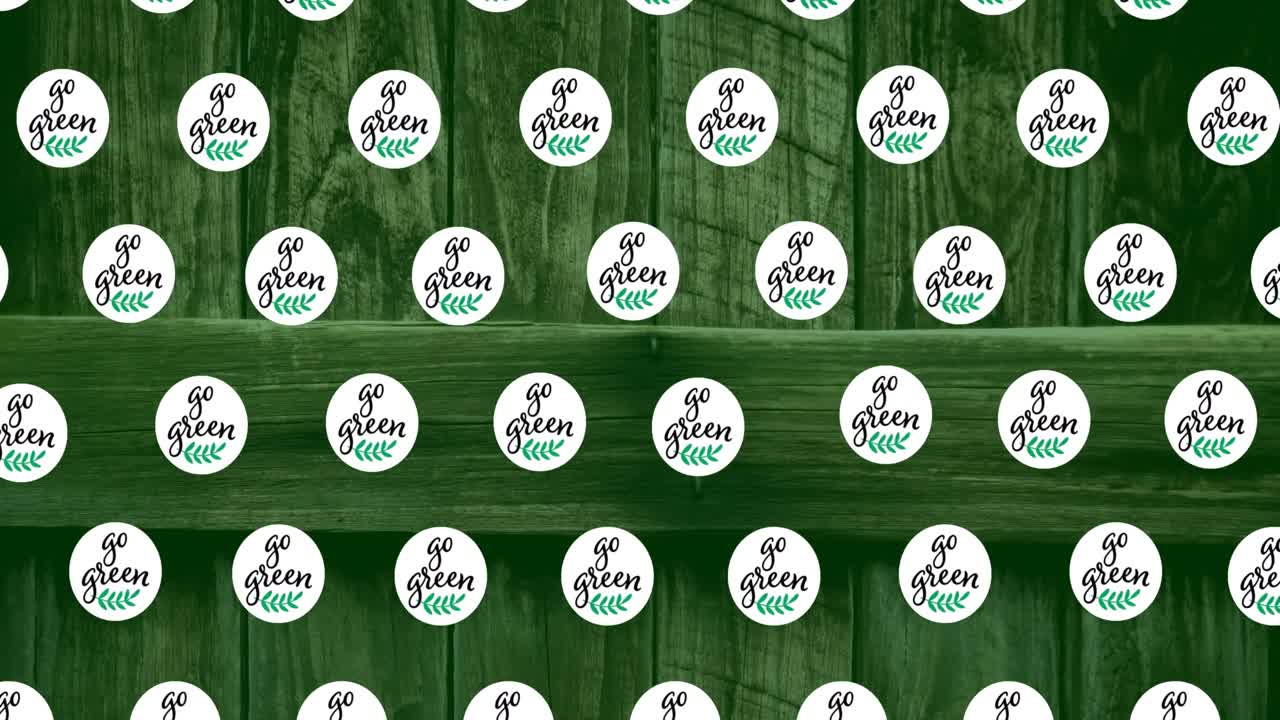 Animation of go green text over wooden background