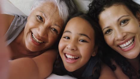happy family lying on bed in bed room 4k