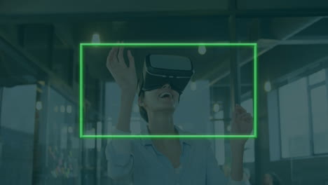 Animation of neon frame over caucasian woman using vr headset in office