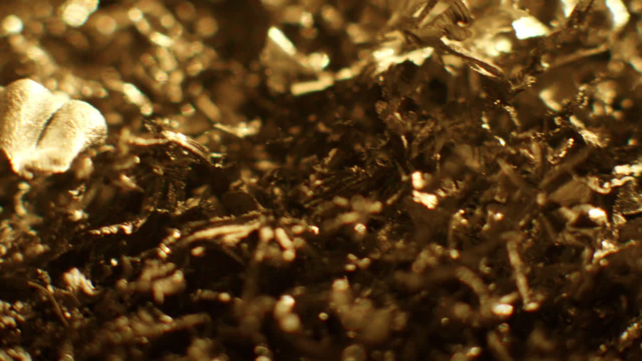 Golden color metal fillings chaotic movement