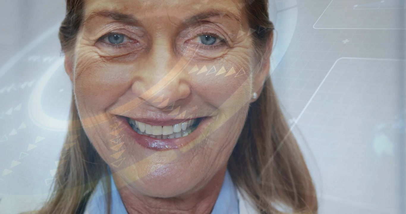 Camera moving upward revealing senior doctor with stethoscope and coat, smiling, conveying warmth