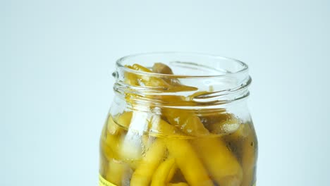 pickled peppers in a glass jar