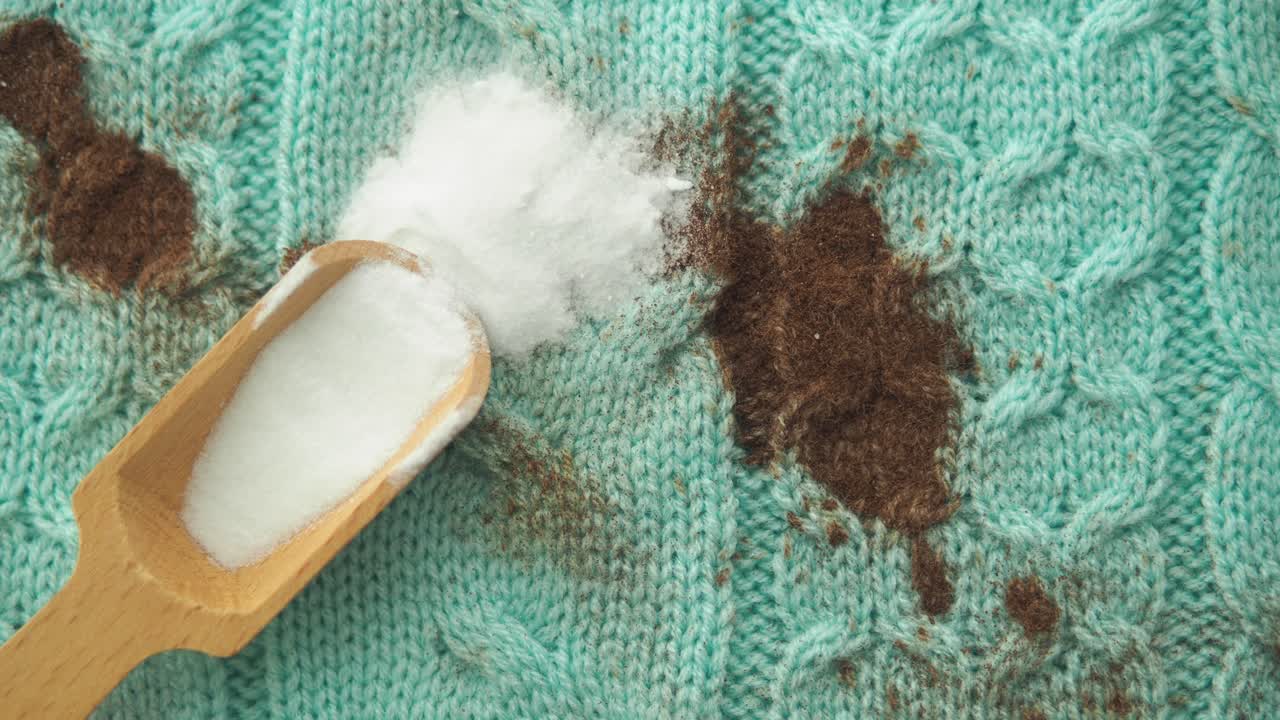 Removing a Stain from a Sweater with Baking Soda