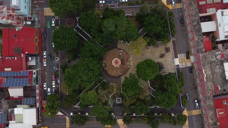 Cenital-roll-shot-of-Huajuapan-de-Leon's-Municipal-Park-in-Oaxaca,-Mexico