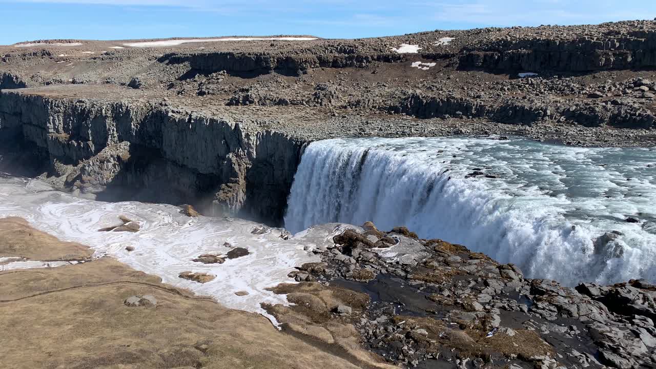 The massive and majestic waterfall Dettifoss in the northeastern part of Iceland, said to be one of the most powerful waterfalls in Europe, shown slightly from above
