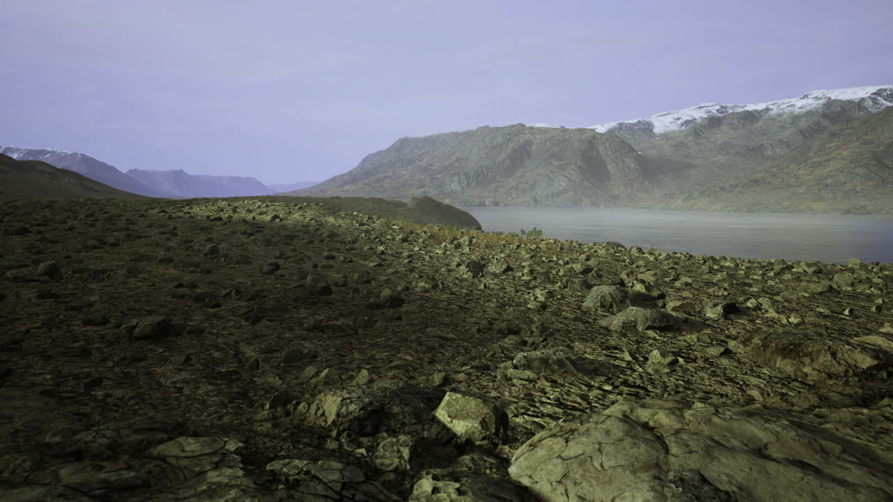 Exploring the rugged terrain by the tranquil glacier lake at dusk