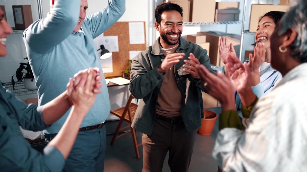 Diverse Business Team Celebrating Success in Office
