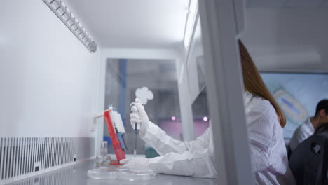 a female scientist working in a laboratory