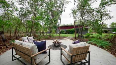 modern-styling-stone-tiled-communal-fire-pit-with-surrounding-chairs