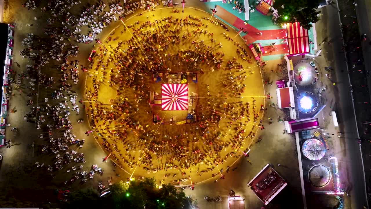 Drone shot of Navratri festival. Navratri is an Indian Festival and It spans over nine nights. crowd in round shape
