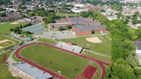 high aerial of school college university campus athletic fields, grounds and school buildings in lancaster pennsylvania usa