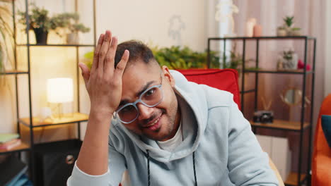 upset sad indian man making face palm gesture, feeling bored, disappointed in fail bad results news