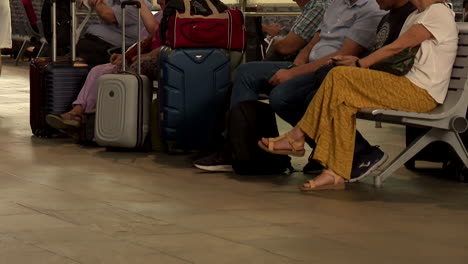 passengers waiting at a train station