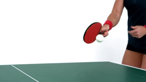 ping pong player hitting the ball