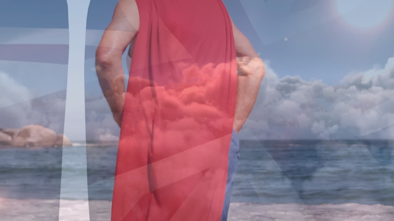 animación de nubes sobre un hombre caucásico mayor vestido con disfraz de superhéroe en la playa